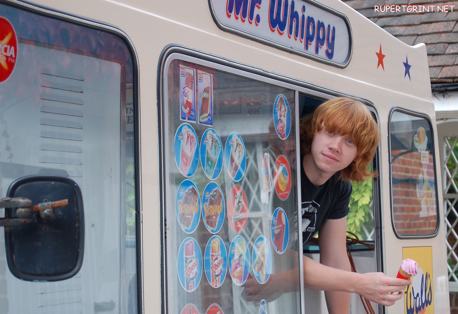 Rupert Grint serving ice cream from his Mr. Whippy ice cream truck